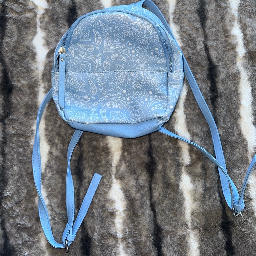 Iight blue small backpack